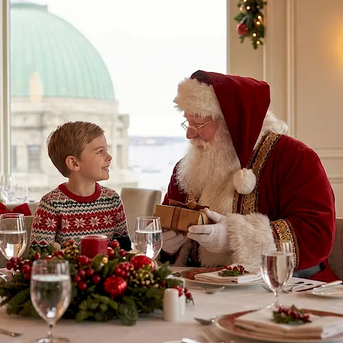 A child in a cozy sweater chats with Santa in a festive dining room, with Christmas lights and gifts on the table.