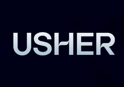 The image shows the word "USHER" written in large, silver letters against a dark background. The middle "S" has a unique design element.